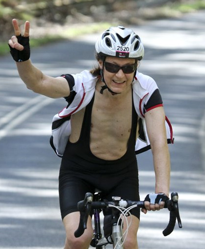 cyclist saluting, original photo copyright Epsom Rd Studios,
permission for this use granted