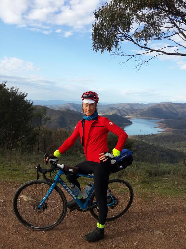 Me bike packing with view over Lake Eildon