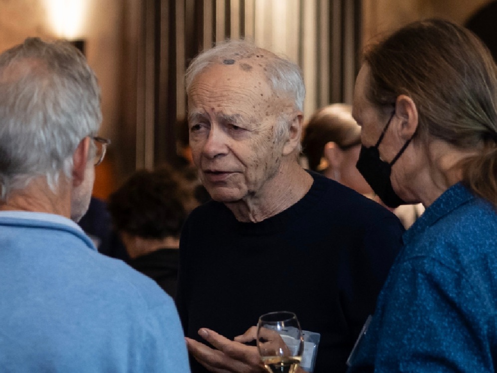 Chatting at Peter Skinner's 80th birthday party